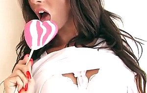 Stunning girl princess sofie licks a lolly while m
