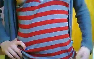 Cute teen ts does a little softcore posing for the cam
