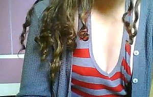 Cute teen ts does a little softcore posing for the cam