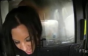 Busty tanned milf fucked in fake taxi from behind