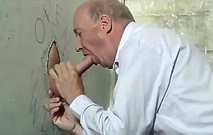 Old man sucking hung cock at gloryhole