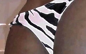 Crossdresser ebony shows her body