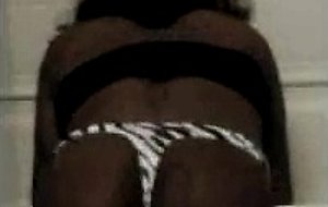 Crossdresser ebony shows her body