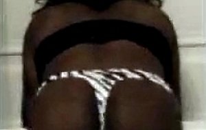 Crossdresser ebony shows her body
