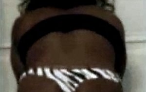 Crossdresser ebony shows her body
