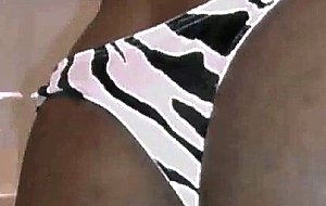Crossdresser ebony shows her body