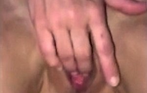 Filming a mature skunk fingering her pussy 