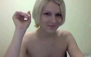 Cute blonde shows her tits on cam