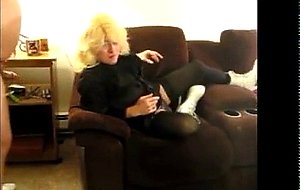 Small, amateur, crossdresser fucked in mouth by owner.