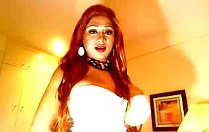 Busty honey tranny masturbates