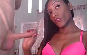 Delicious chocolate shemale stroking her bf's cock 