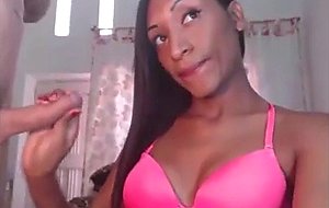 Delicious chocolate shemale stroking her bf's cock 