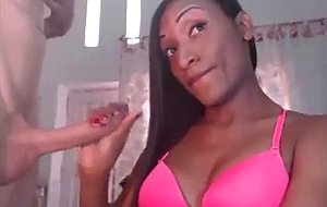 Delicious chocolate shemale stroking her bf's cock 