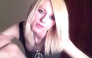 Platinum blonde emo tgirl does a bit of softcore posing