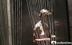 Cute babe with big boobs has a shower