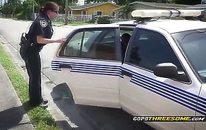 Big titted milf in cop uniform loves sucking a BBC