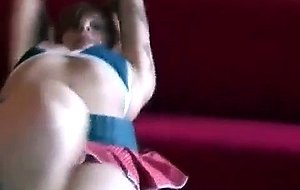 Tattooed and busty emo bitch strips and dances on the couch