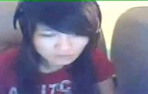 Horny young teen shows off her pussy on webcam