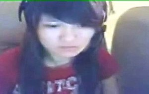 Horny young teen shows off her pussy on webcam