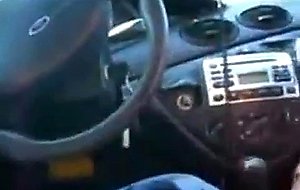 Brunette slut sucks cock in a car 