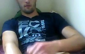 Handsome college guy masturbating
