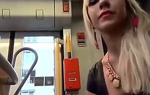 confident girlfriend gives nervous boyfriend blowjob on bus