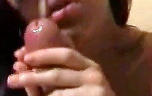 Brunette strokes the cock to a jizz blast