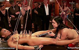 Ebony slave holding heavy padlocks