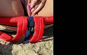 Busty fat pussy vibrating orgasm at the beach watching porn