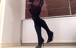 Black suspender pantyhose.