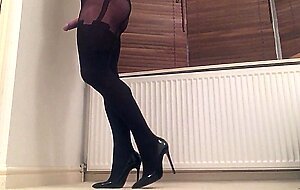 Black suspender pantyhose.