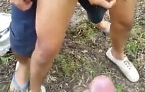 3 Asian boys having fun in woods (1'03'')