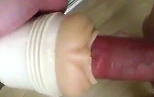 Teasing my big cock with fleshlight and cock ring.