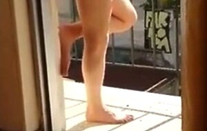 Masturbating naked in his balcony