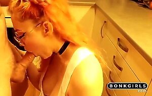 Amateur kitchen fucking with a big titty redhead