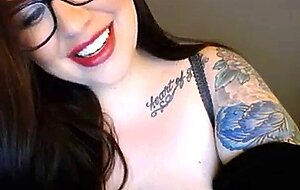 Nerdy babe with some of thebiggest webcam boobs