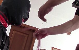 Kneeling, Gagged, and Hooded: Huge Cumshot on Her Mouth