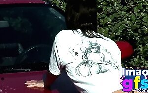 Two Hot Brunette Naked Carwash showing big medium tits and perfect ass