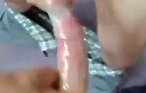 Two Guys Cum Together in a Condom