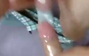 Two Guys Cum Together in a Condom