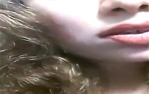 Masturbating