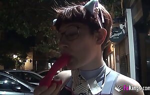 Busty nerd redhead looks for guys to suck in a public street