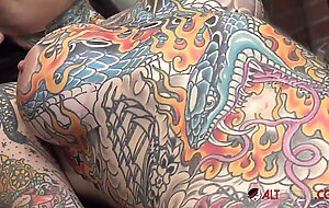 Tiger Lilly gets a forehead tattoo while naked