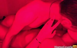 Real Couple having Passionate and Romantic Sex under Red Led Lights