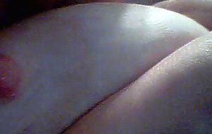 Licking and sucking my own tits