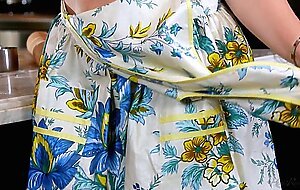 Pornstar Dani Daniels gets hot and horny while cooking in her kitchen