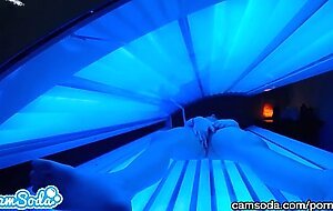 teen latina gets caught rubbing her clit while using a tanning bed