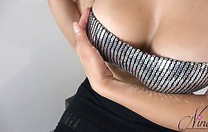 Busty Babe Nina StrongHold showing off her big titties and hard cock