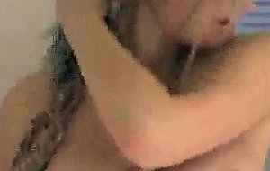Candy cain oiling her tits and ass