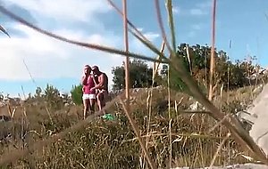 Voyeur films a couple fucking outdoors